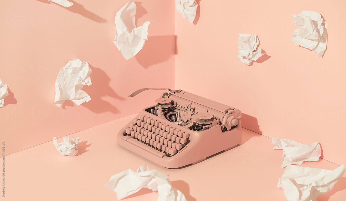 Pink Office Typewriter With White Paper