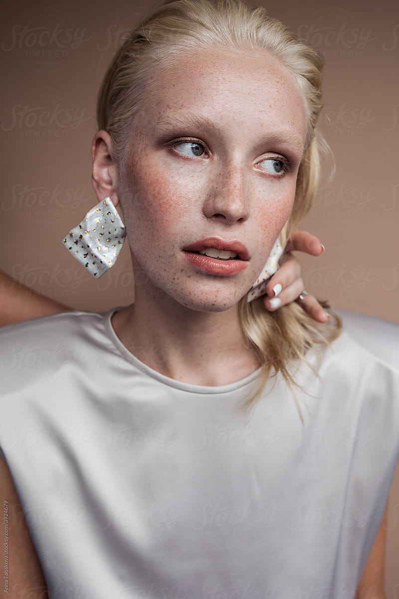 Young model wearing earrings