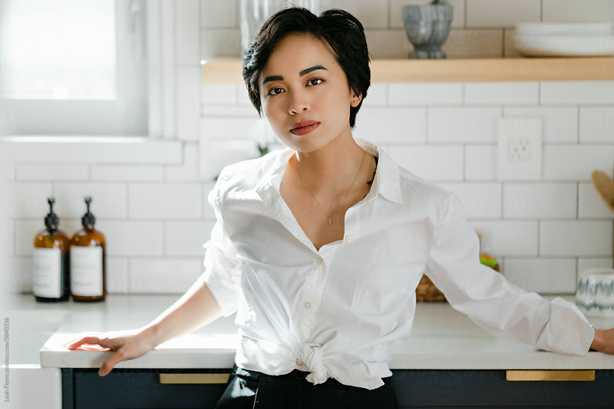 Beautiful Asian Woman in Kitchen