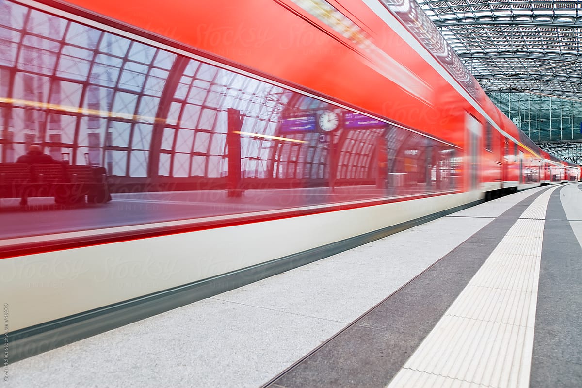 Europe, Germany, Berlin, new modern main railway station  - train pulling into the platform