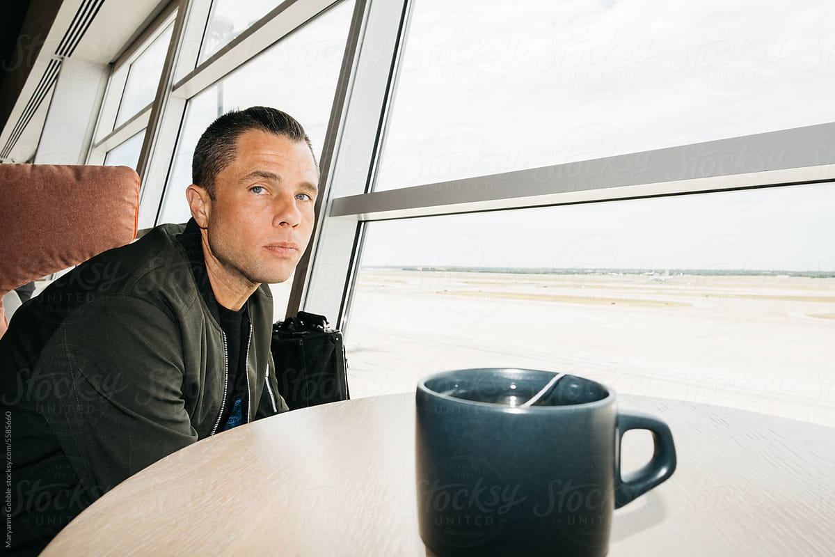 Man Sitting in Airport Lounge