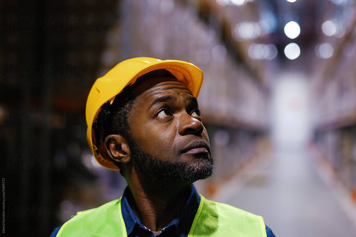 Black warehouse worker at distribution center