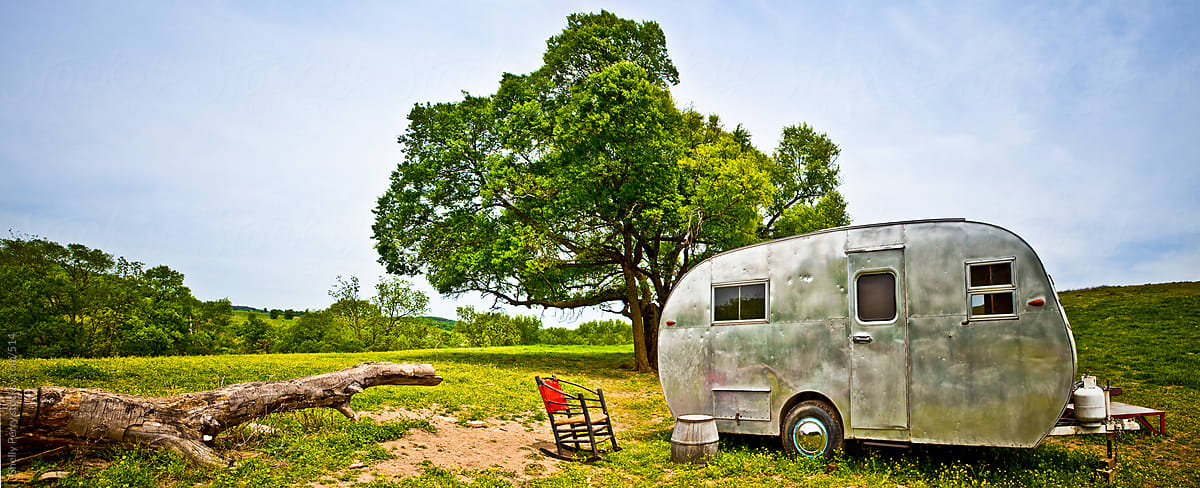 Old Travel Trailer on a Country Hillside