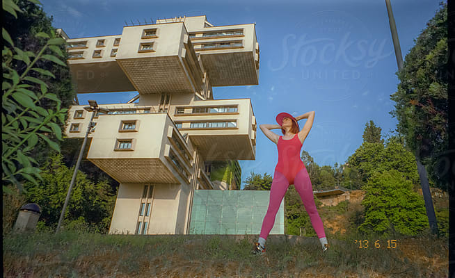 A Slender Attractive Girl In 80's Clothes Is Engaged In Fitness by Stocksy  Contributor Dima Sikorski - Stocksy
