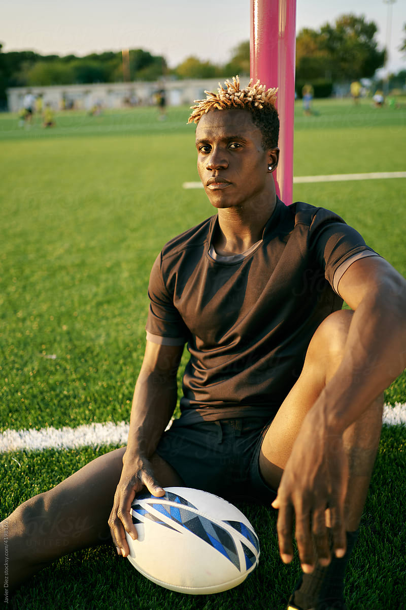 Black rugby player on sports field