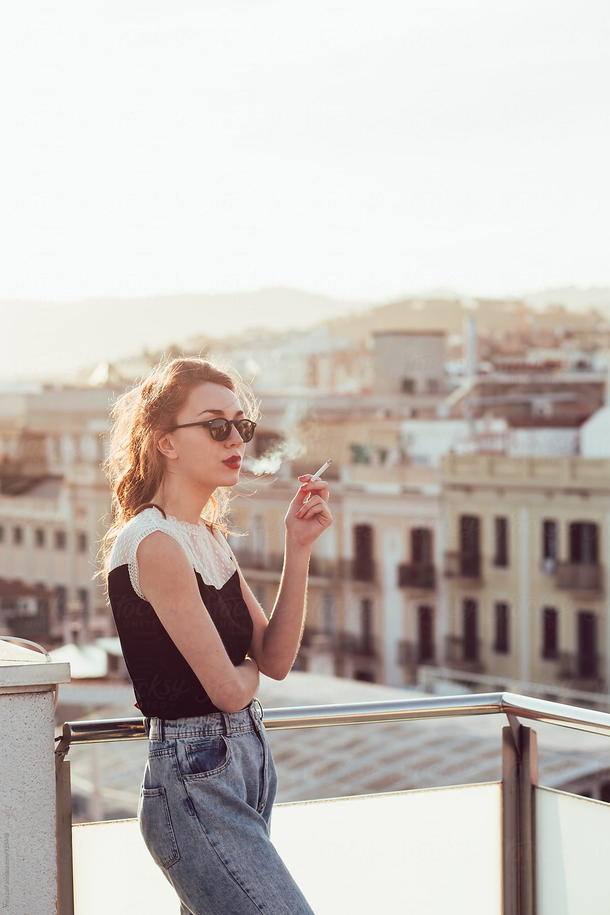 Beautiful woman smoking outdoor