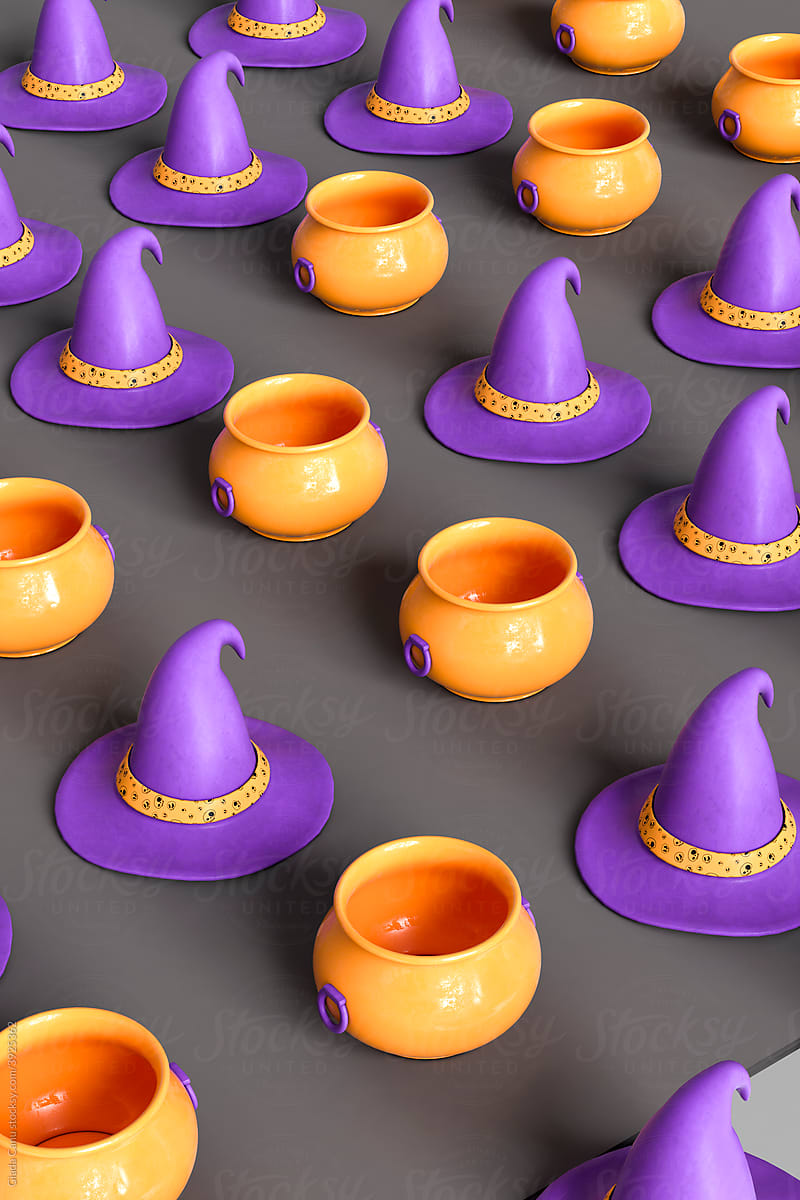 pattern of orange cauldrons and purple witch hat on dark grey background
