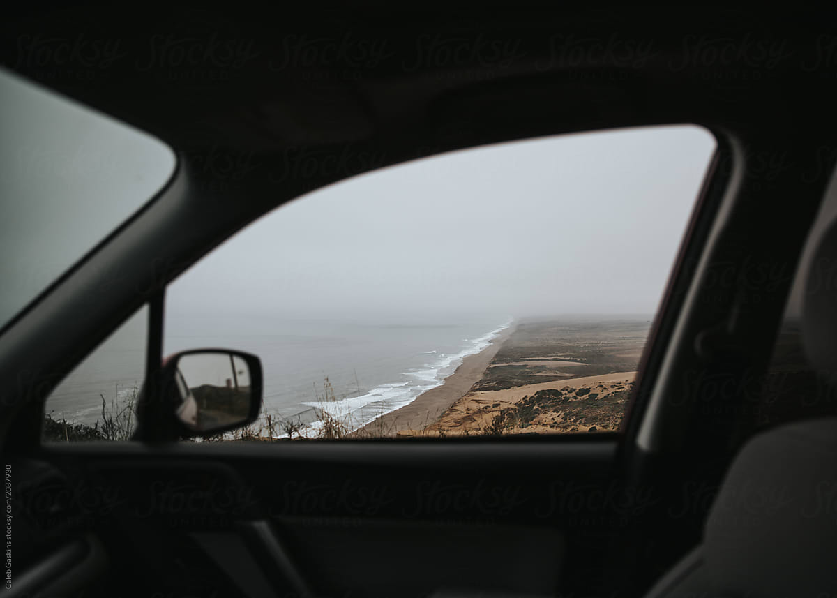 View Of Ocean Through Car Window By Caleb Mackenzie Gaskins Stocksy United