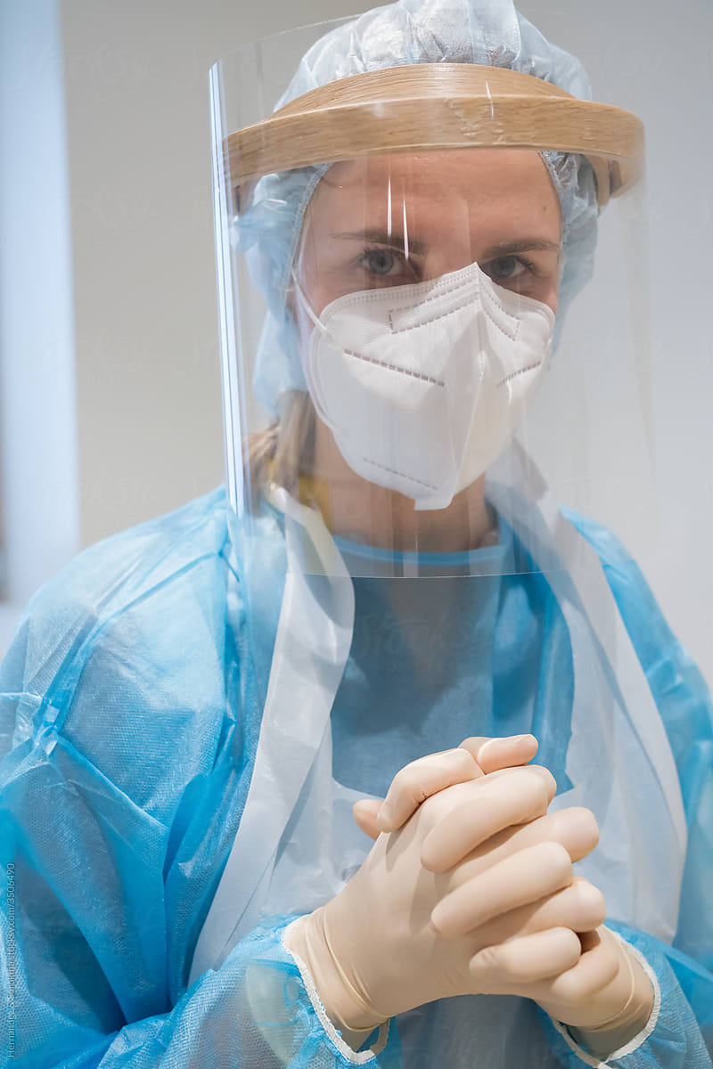 Portrait Of Doctor Wearing Protective Clothes