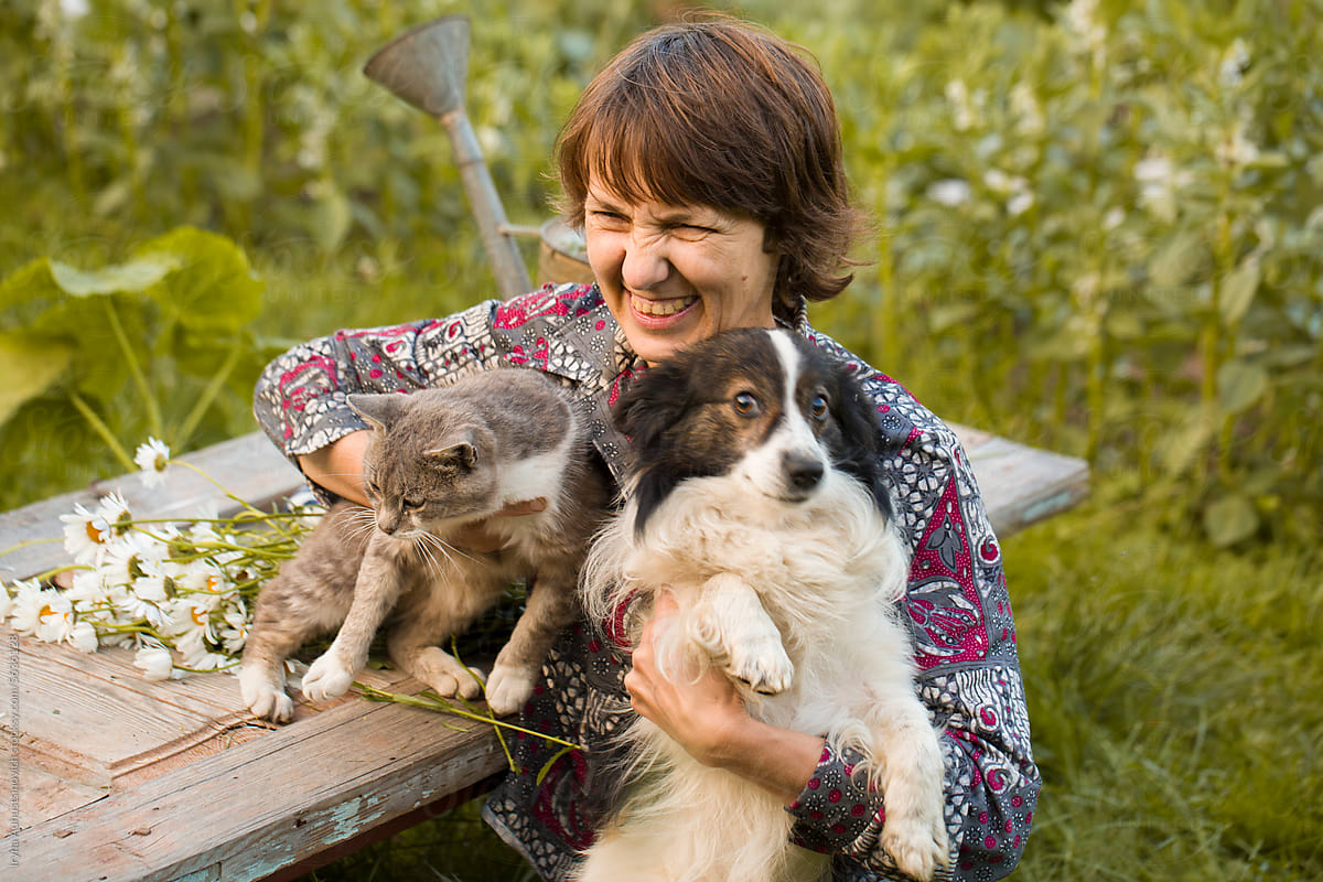 portrait of cheerful mature smiling woman ,animal lover