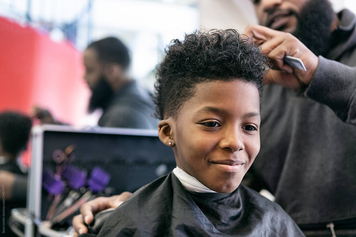 Barber Smiling Young Man Getting A Haircut By Sean Locke