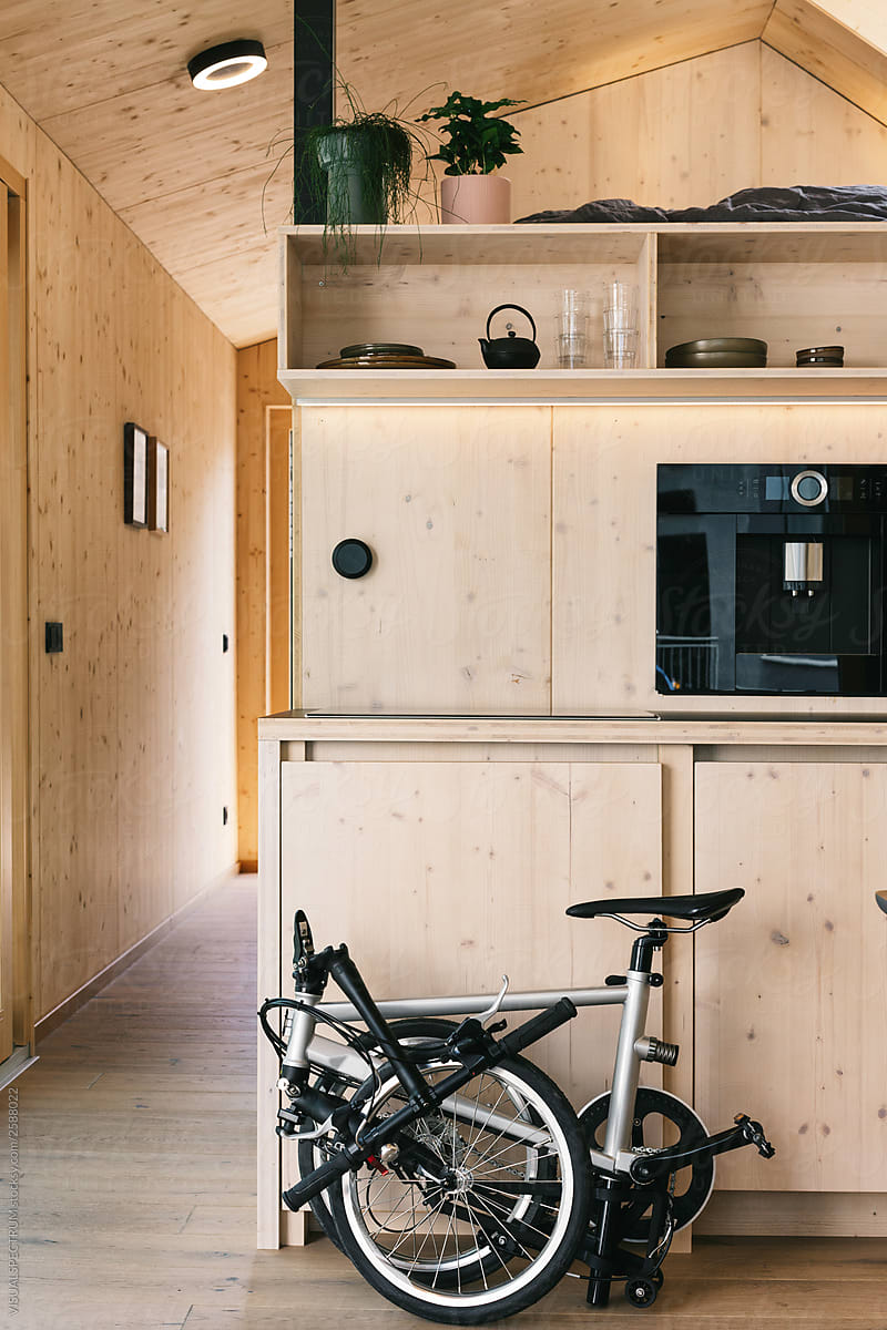 Wooden Tiny House Interior With Folding Bike