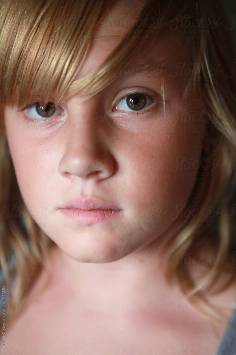Serious Portrait Of Pre Teen Girl With Brown Eyes By Stocksy Contributor Dina Marie