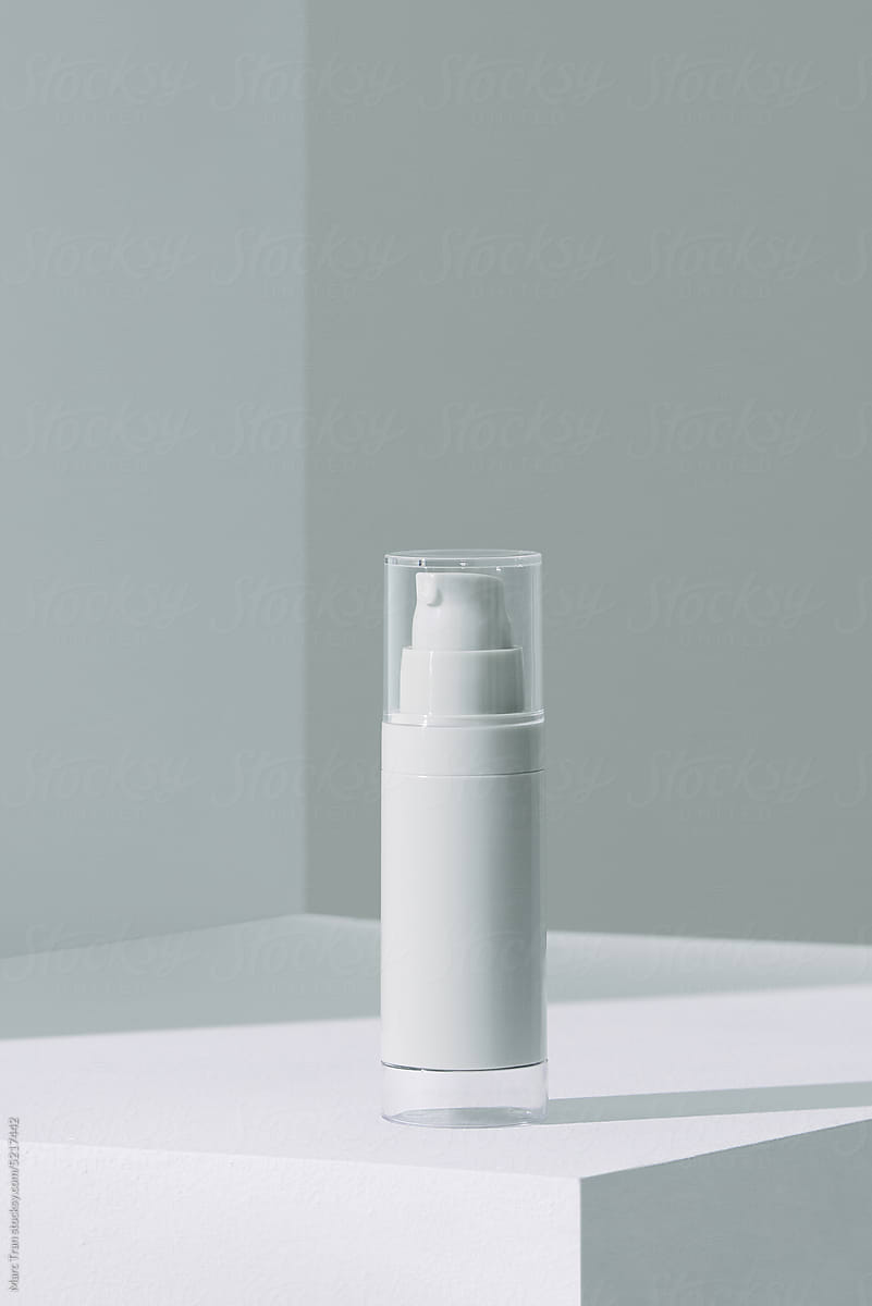 Container of spray serum skincare bottle