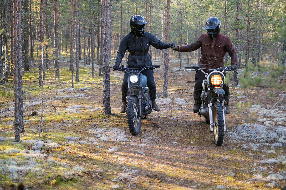 Two riders in helmets