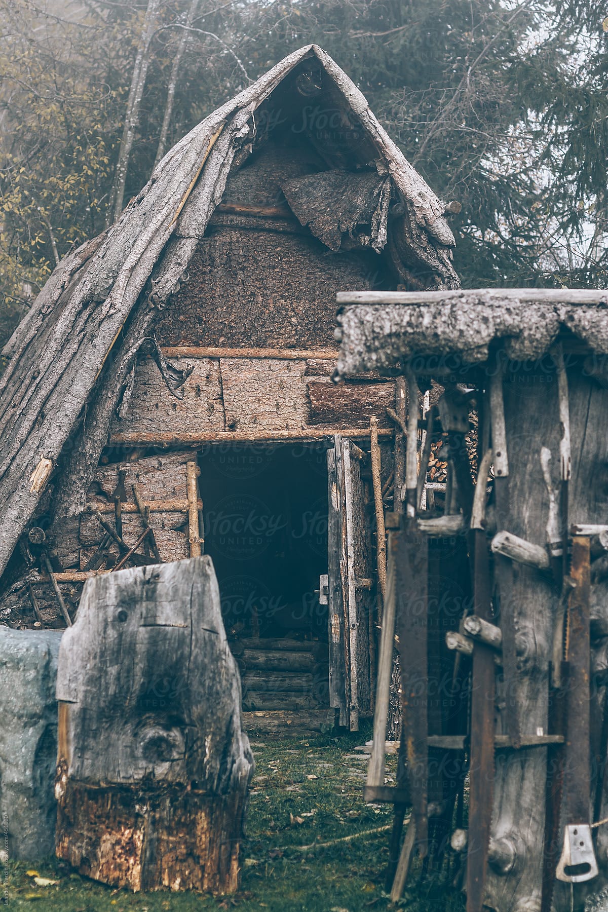 old rustic bark mulch shack