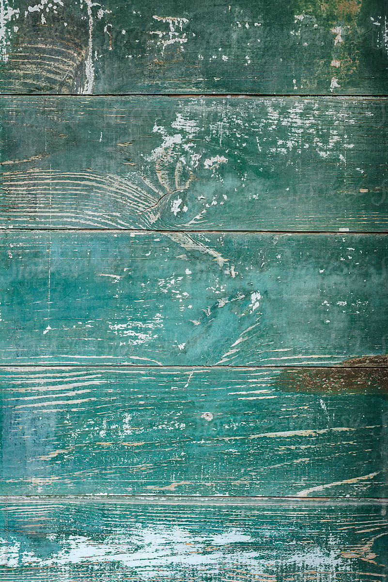 Texture of woonden green painted closet in decay