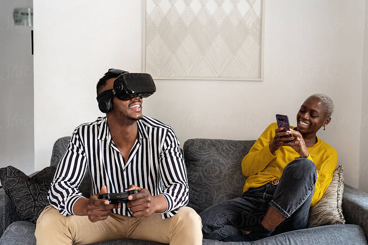 Black woman shooting boyfriend in VR helmet