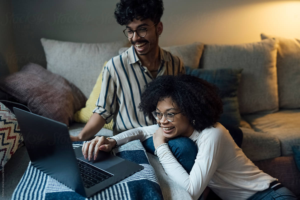 Young Black Couple using a Laptop at Home