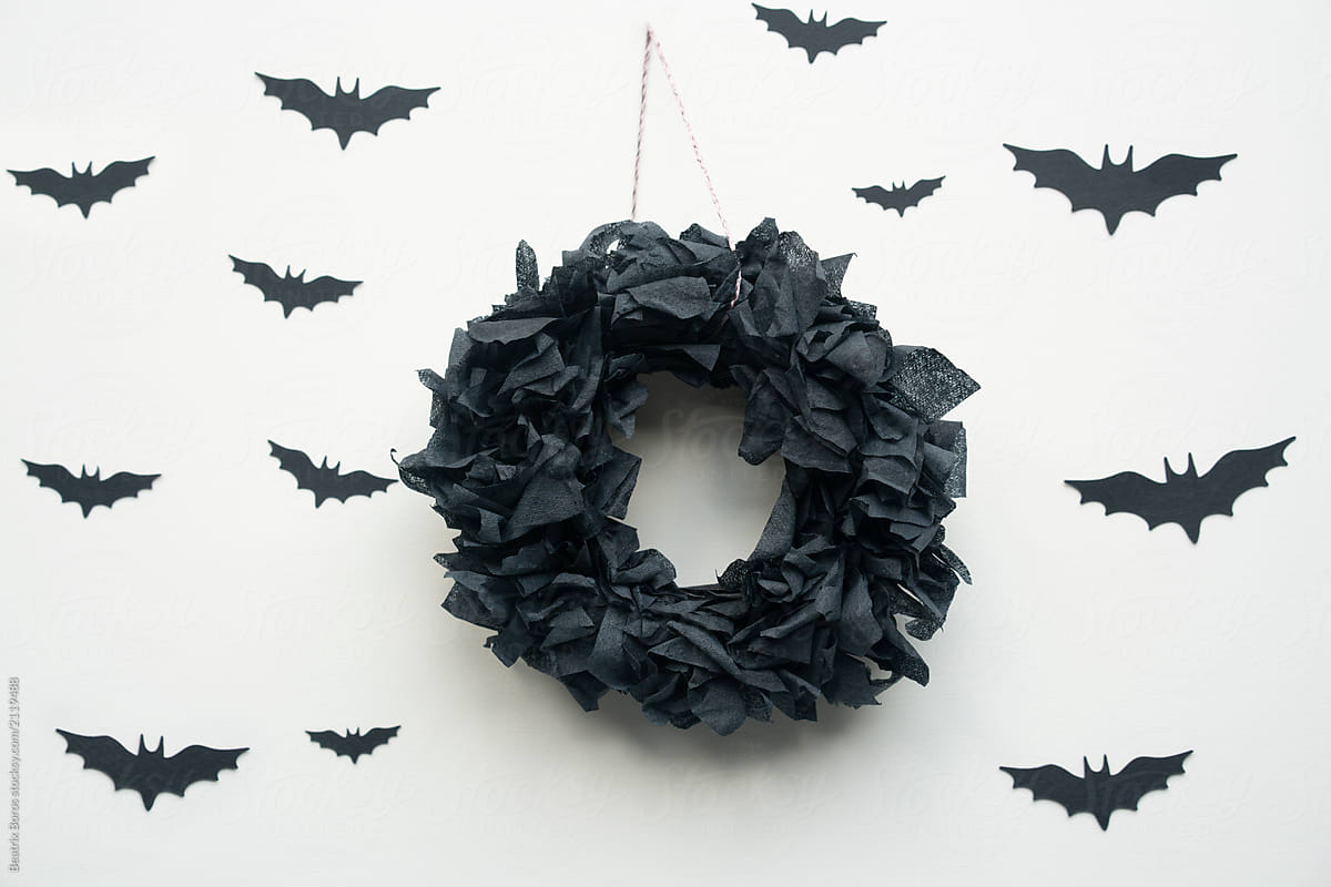 Black tissue paper wreath with paper bats all over