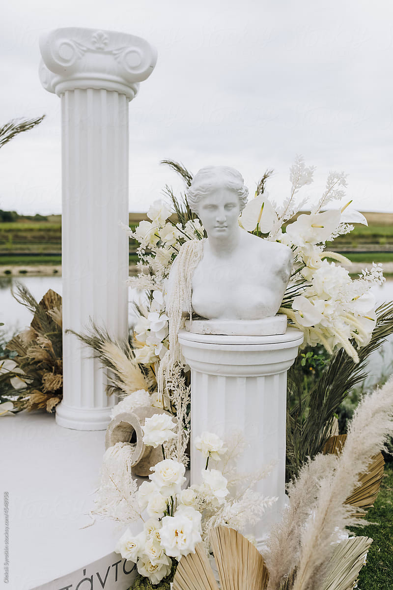Marble sculpture among flowers on event