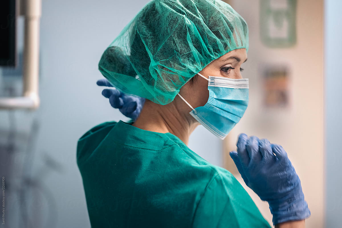 Portrait of Nurse Using Face Mask in Surgery Room
