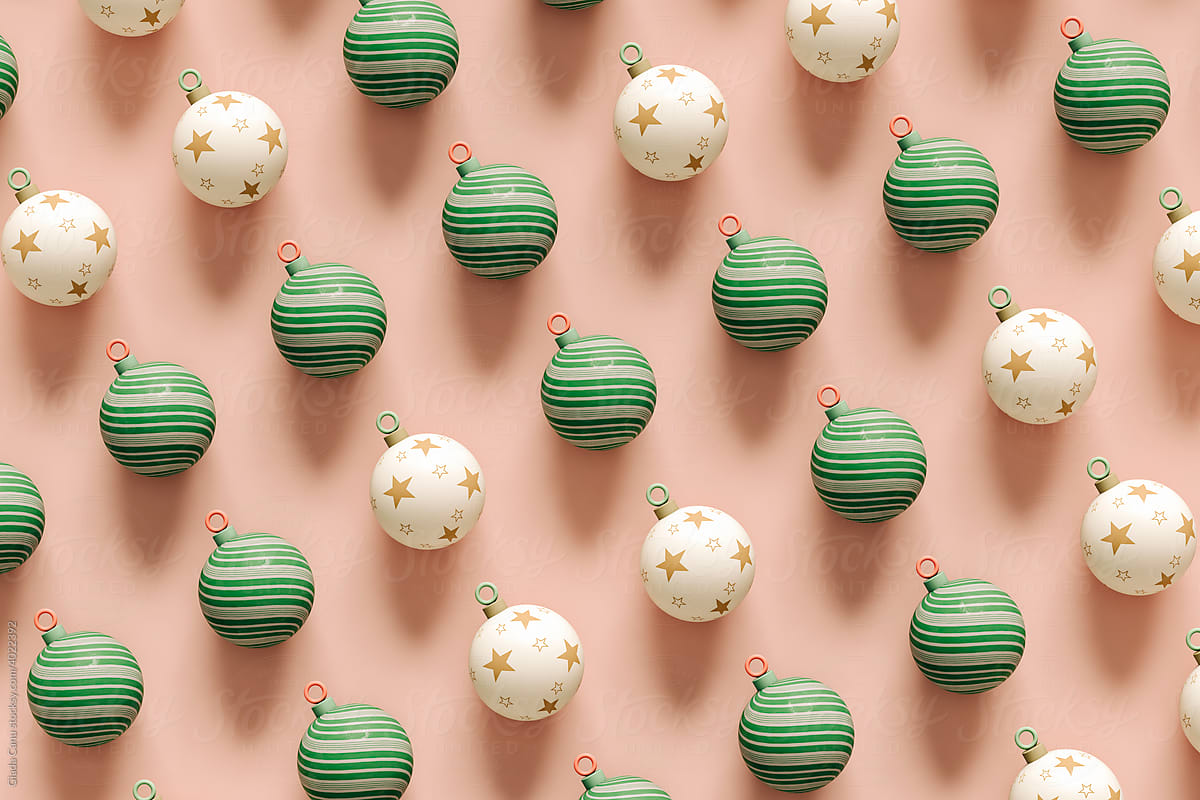pattern of Christmas balls on pink background
