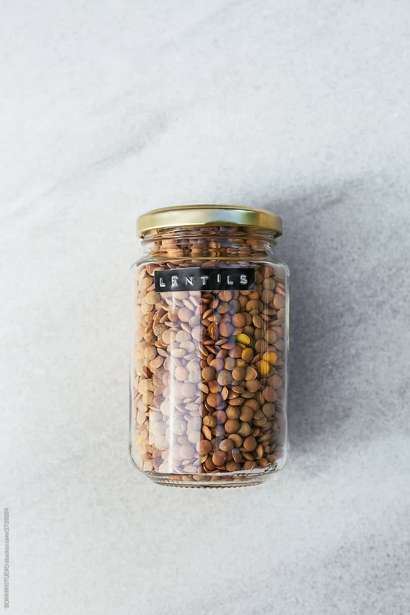 Jar of lentils on marble table