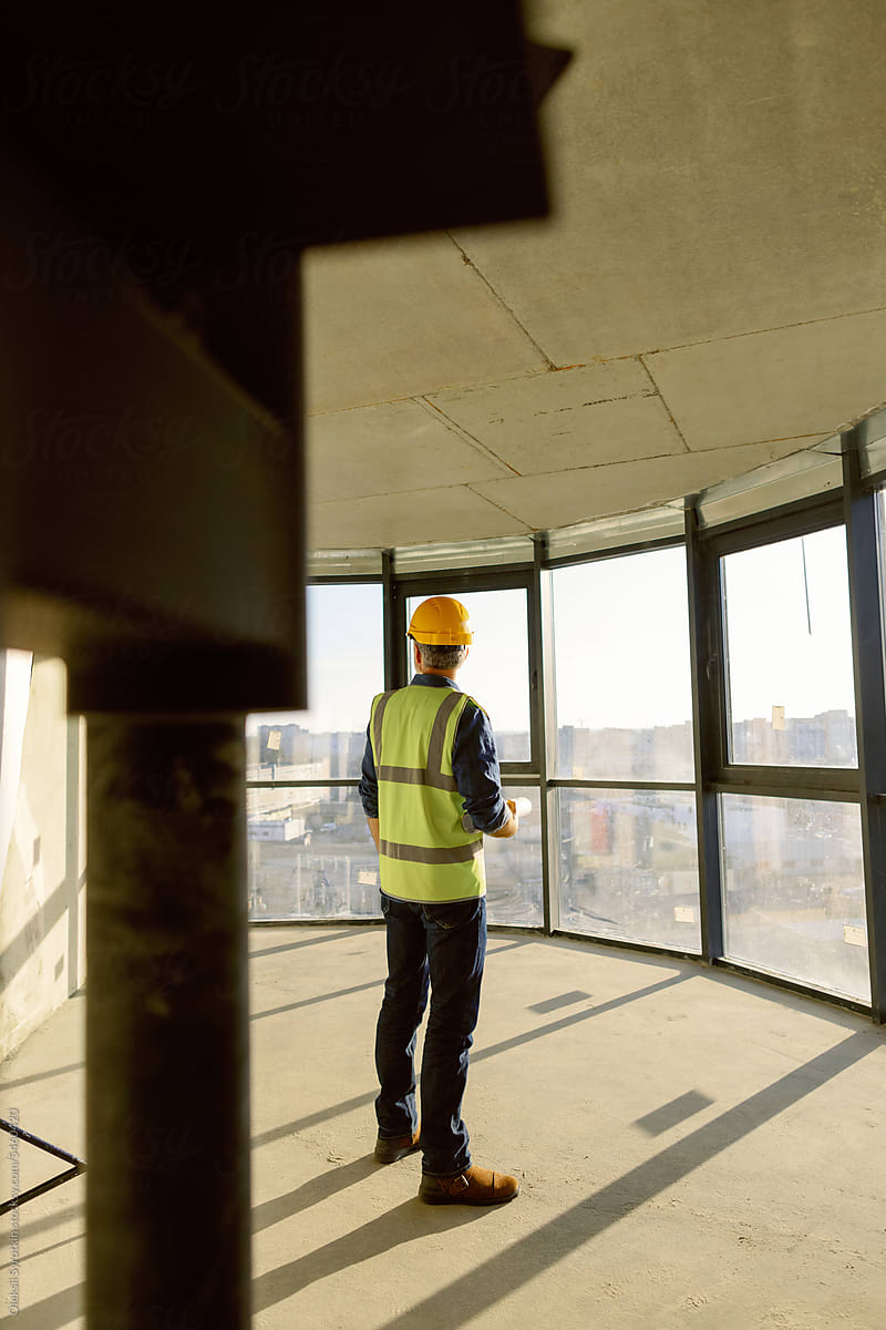 Builder Examine Construction Site Space
