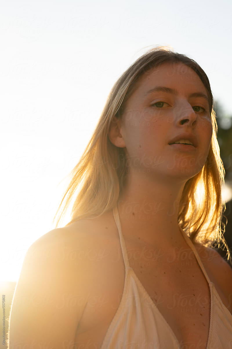 Blonde Woman Without Make-up During Golden Hour