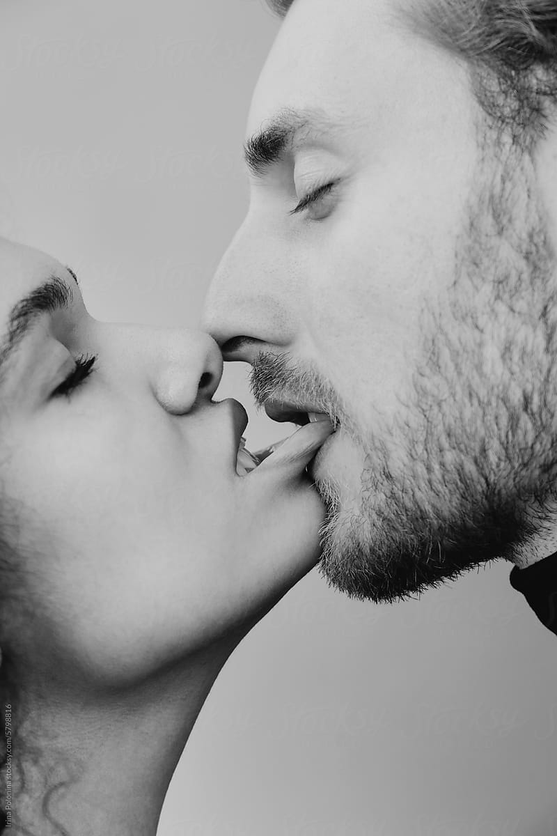 Black and white kissing of man and woman.