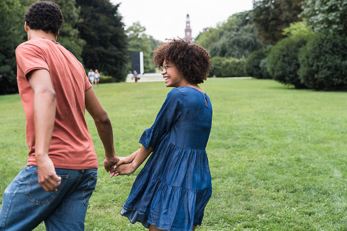Happy young black couple in the park