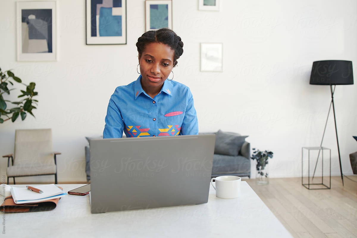 Freelance black girl working from home