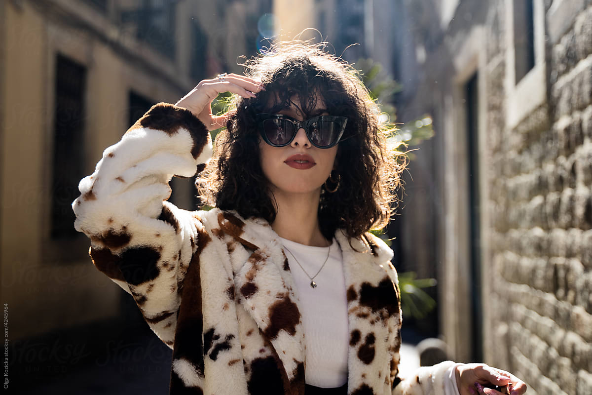 Curly Hair Woman With Red Lips And Sunglasses