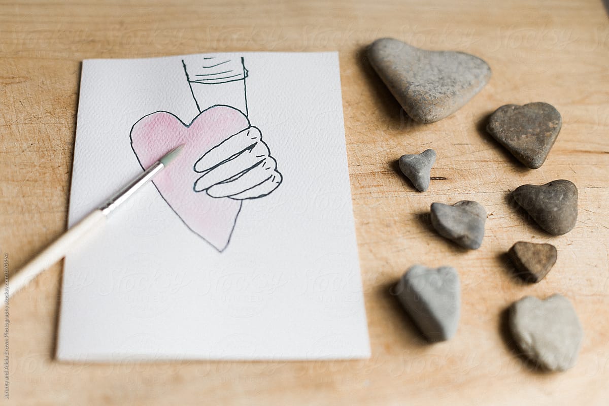 Watercolored heart and rocks shaped like hearts