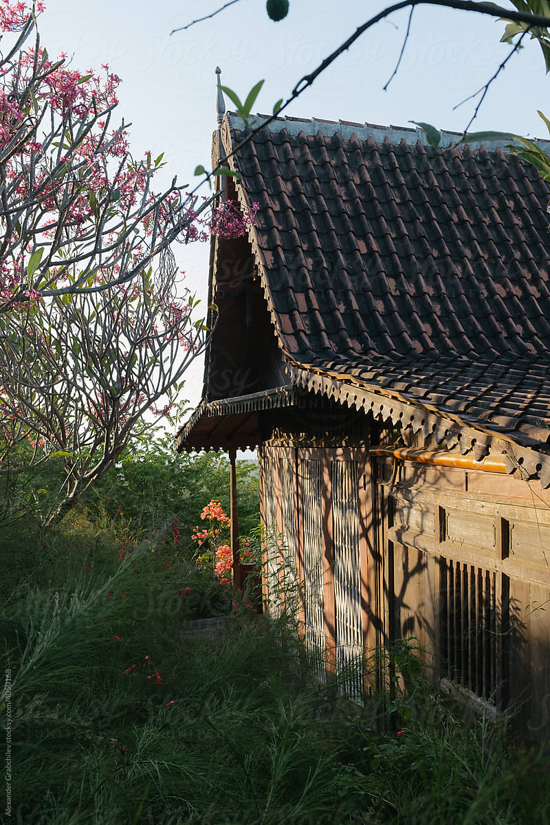 Wooden House With A Tiled Roof