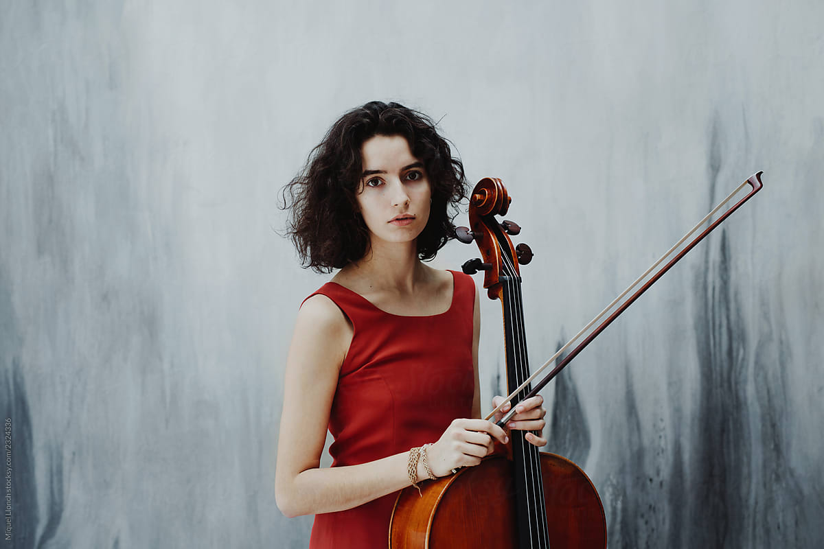 Young woman with cello instrument
