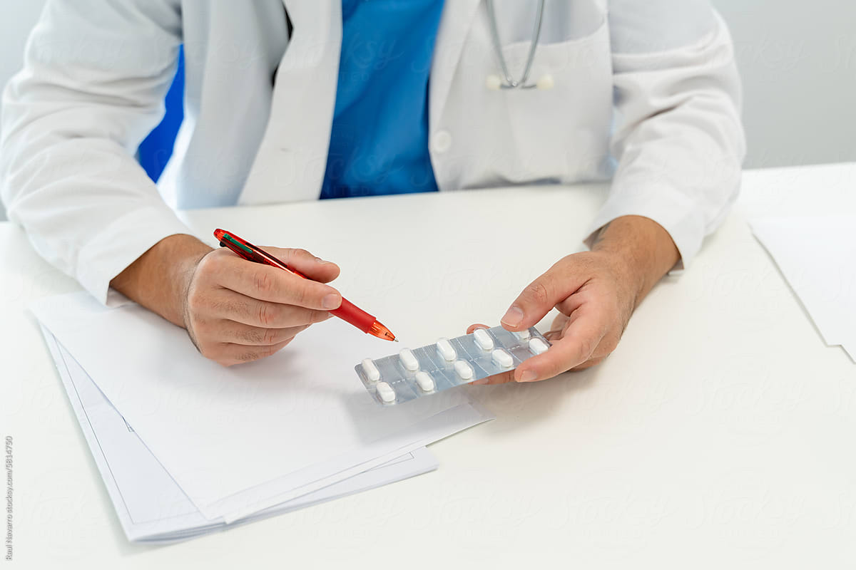 doctor prescribing medication to a patient