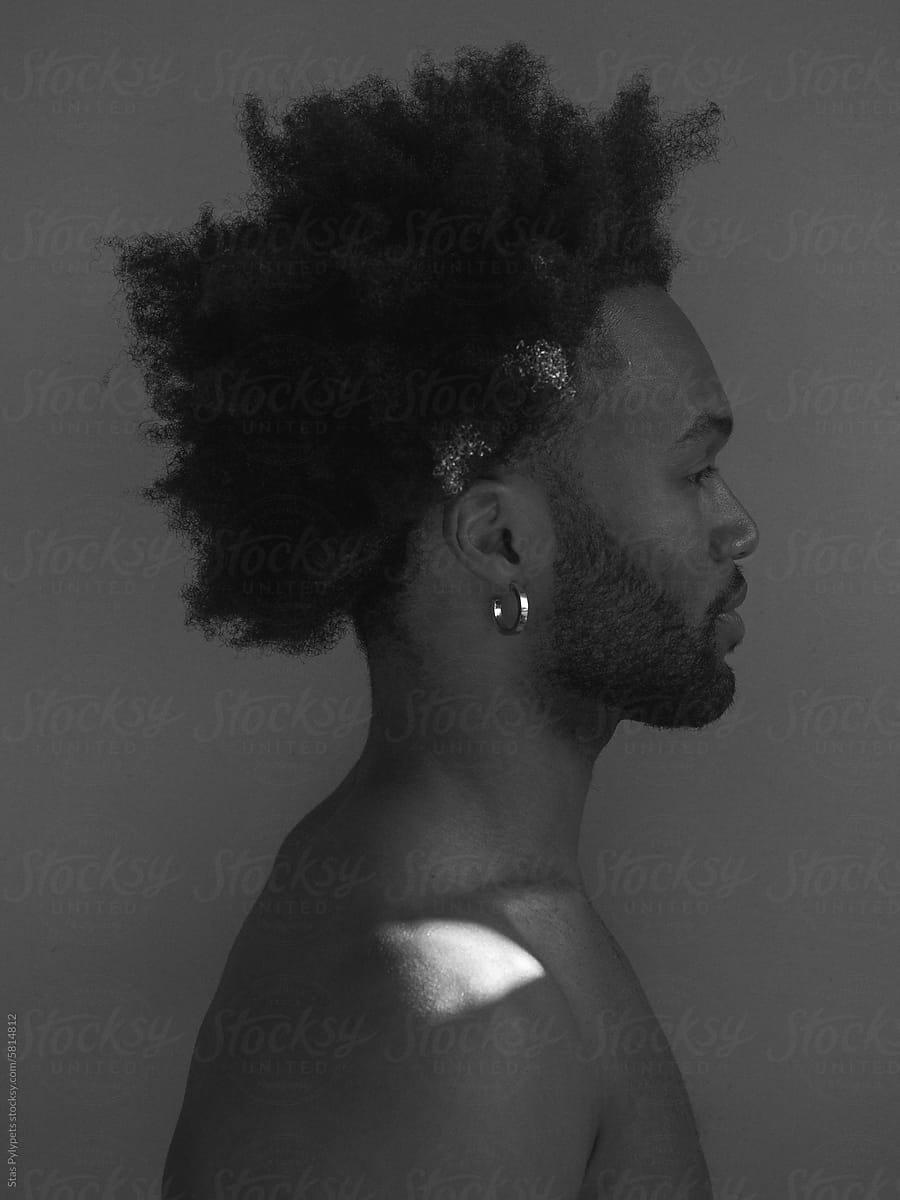 Black and white portrait of handsome black guy