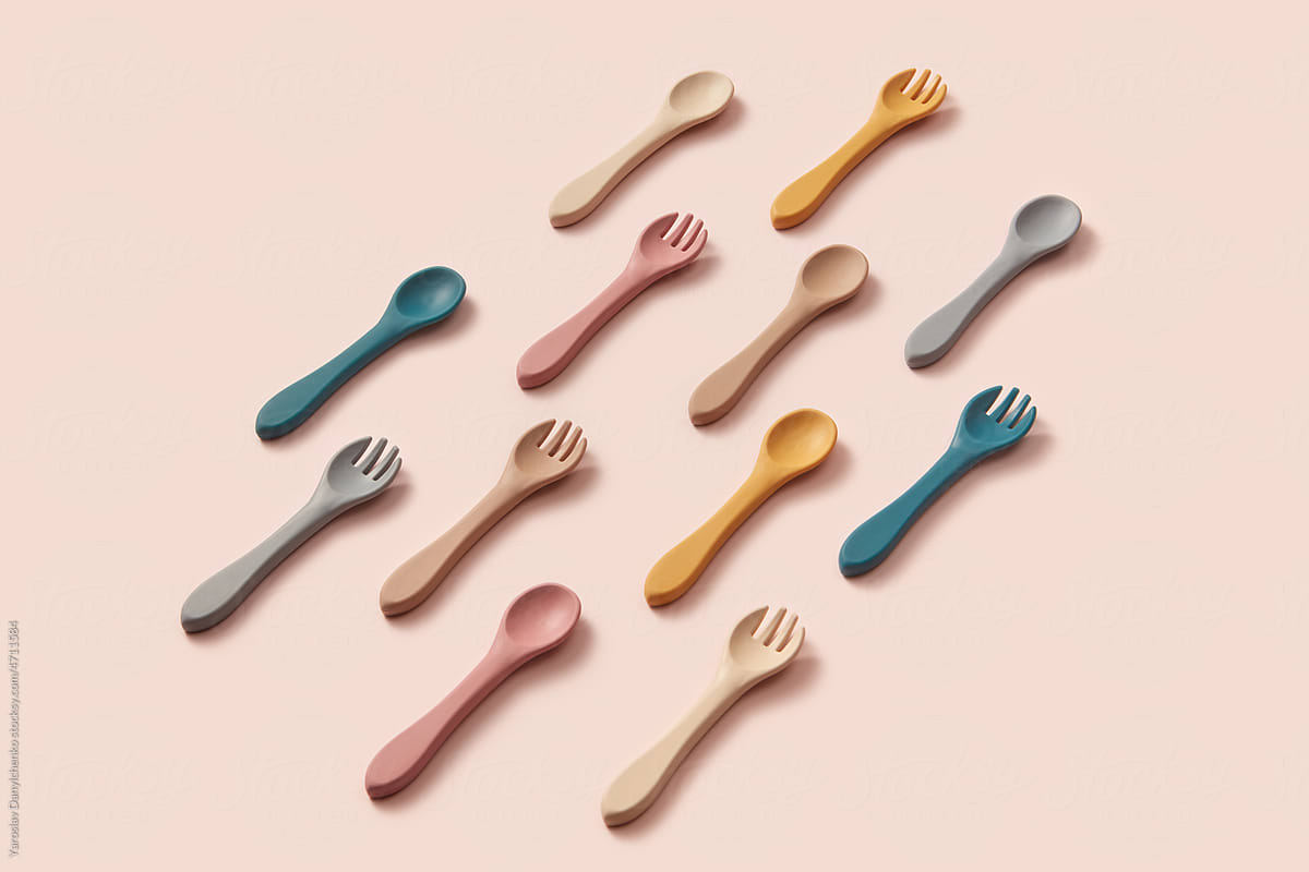 Arrangement of kids silicone spoons and forks