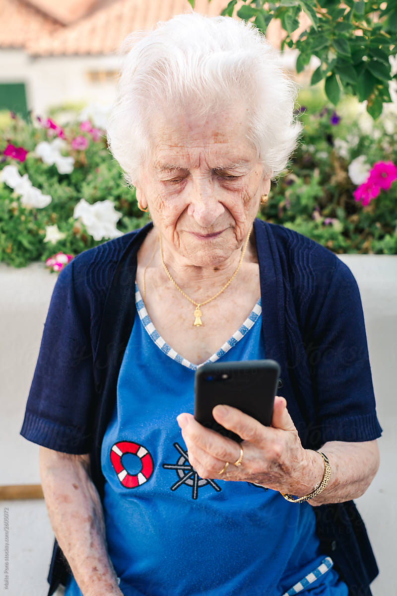 Portrait of a Senior Woman Using a Mobile Device
