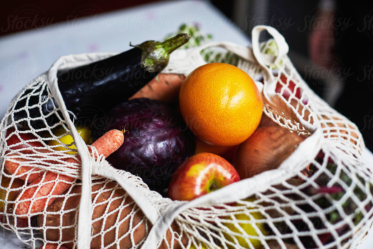 Fruit and vegetables on a string shopping bag