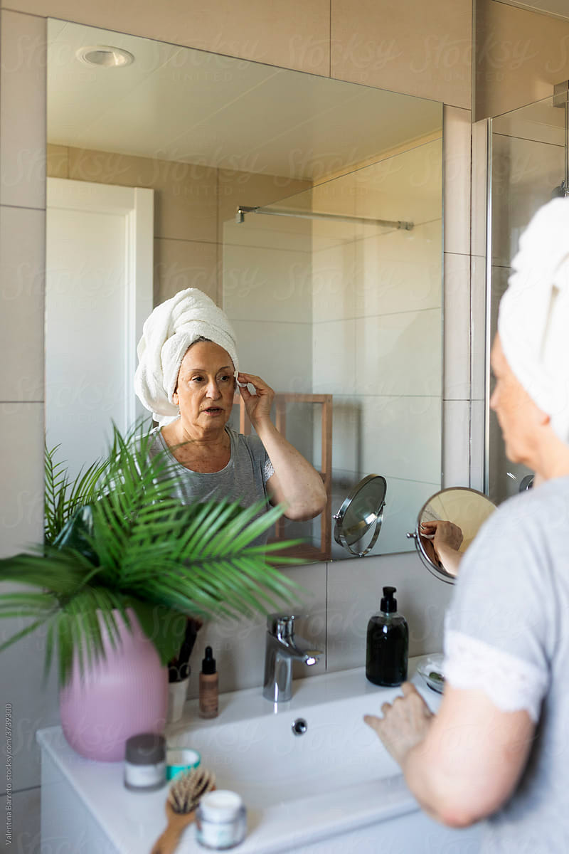 Mature woman taking care of herself