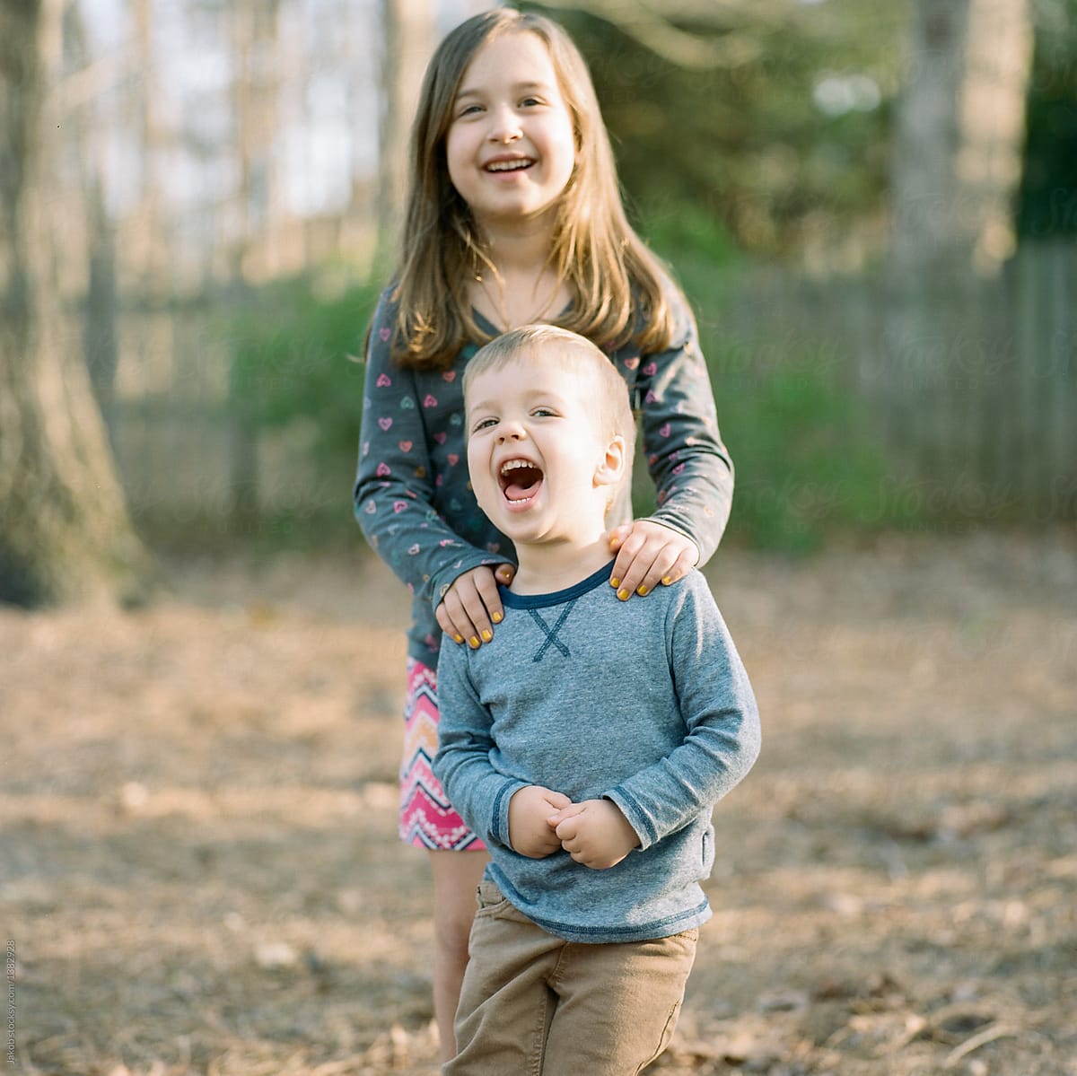 Adorable Siblings Hugging Each Other by Stocksy Contributor Jakob  Lagerstedt - Stocksy
