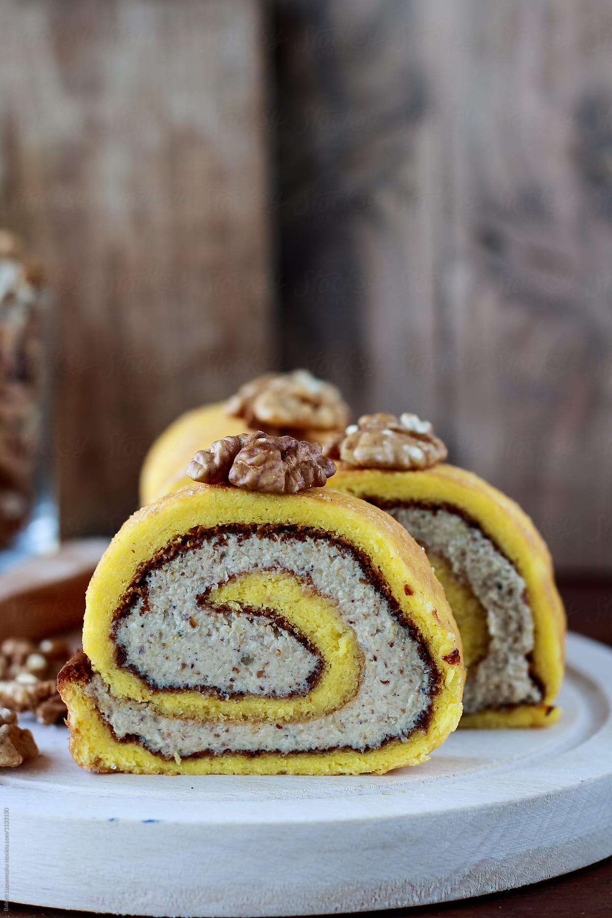 Pumpkin sponge cake rolls with walnut cream