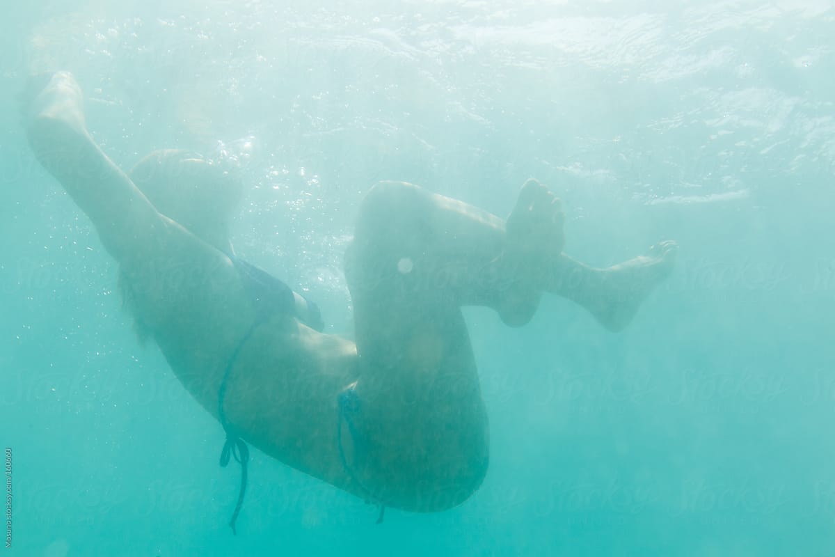 Anonymous Woman Underwater By Stocksy Contributor Mosuno Stocksy