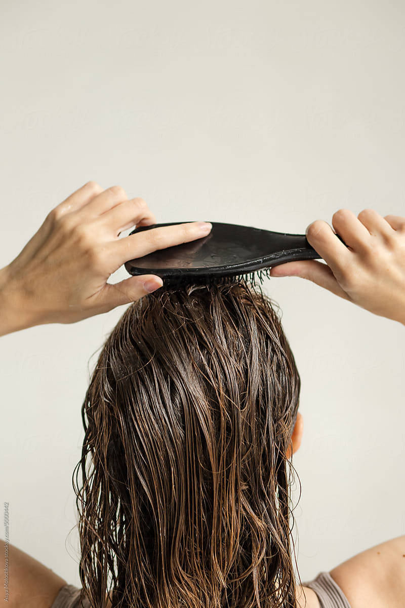 Combing wet hair beauty care concept