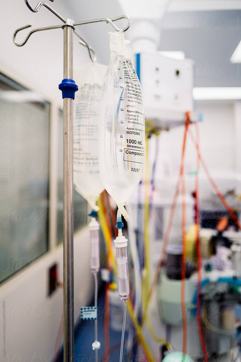 Bag of fluids on IV pole in operating theatre