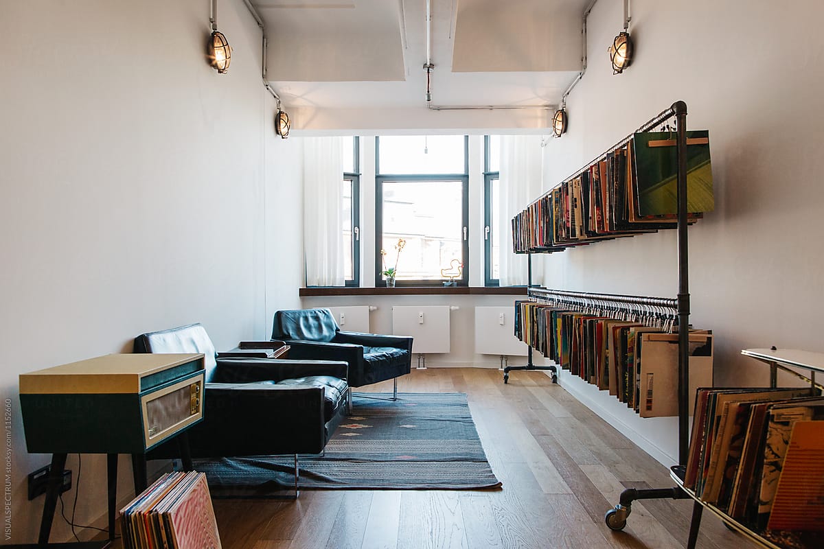 Leather Armchairs and Record Collection in Minimalist Bright Lounge