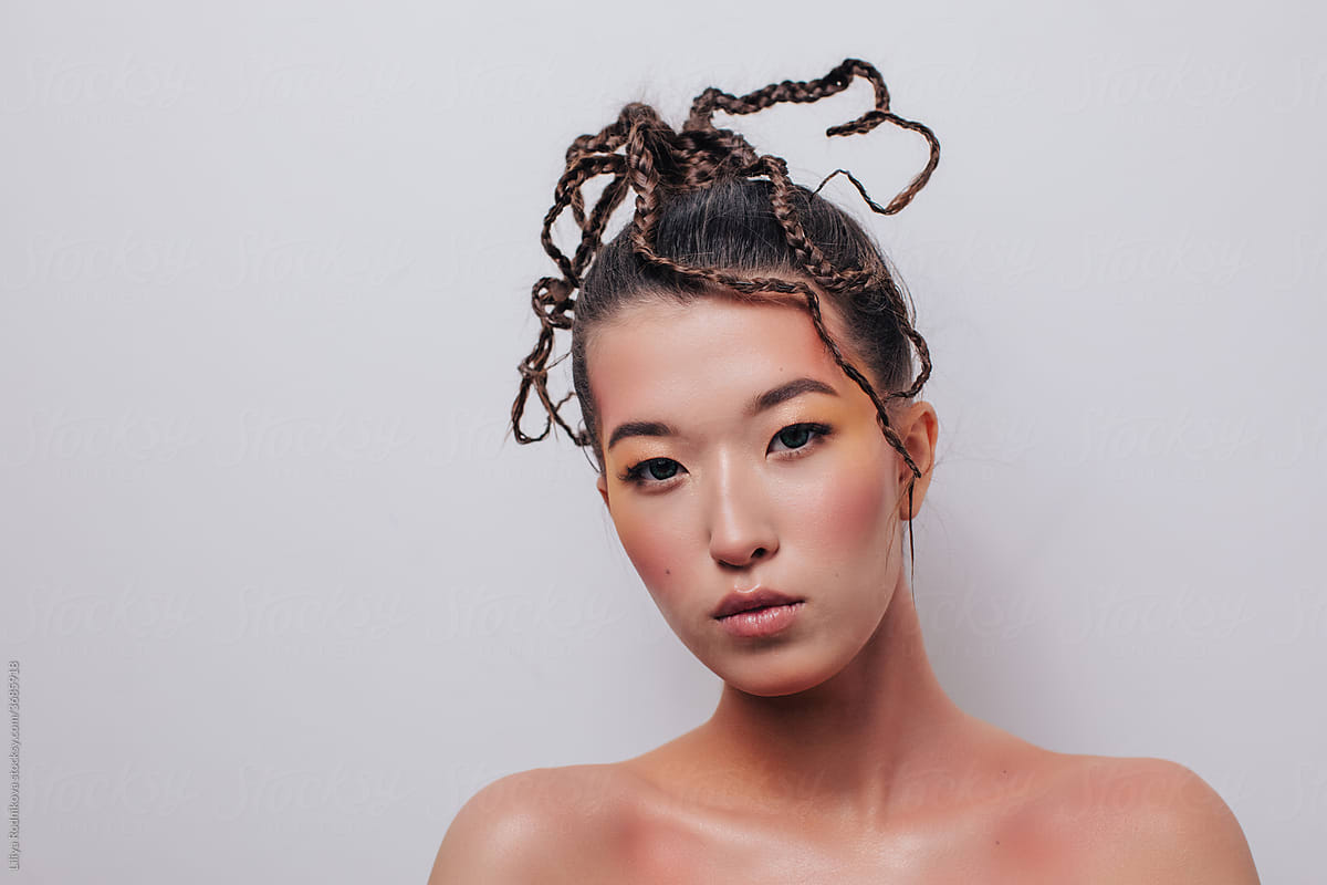 Asian woman with unique hairstyle